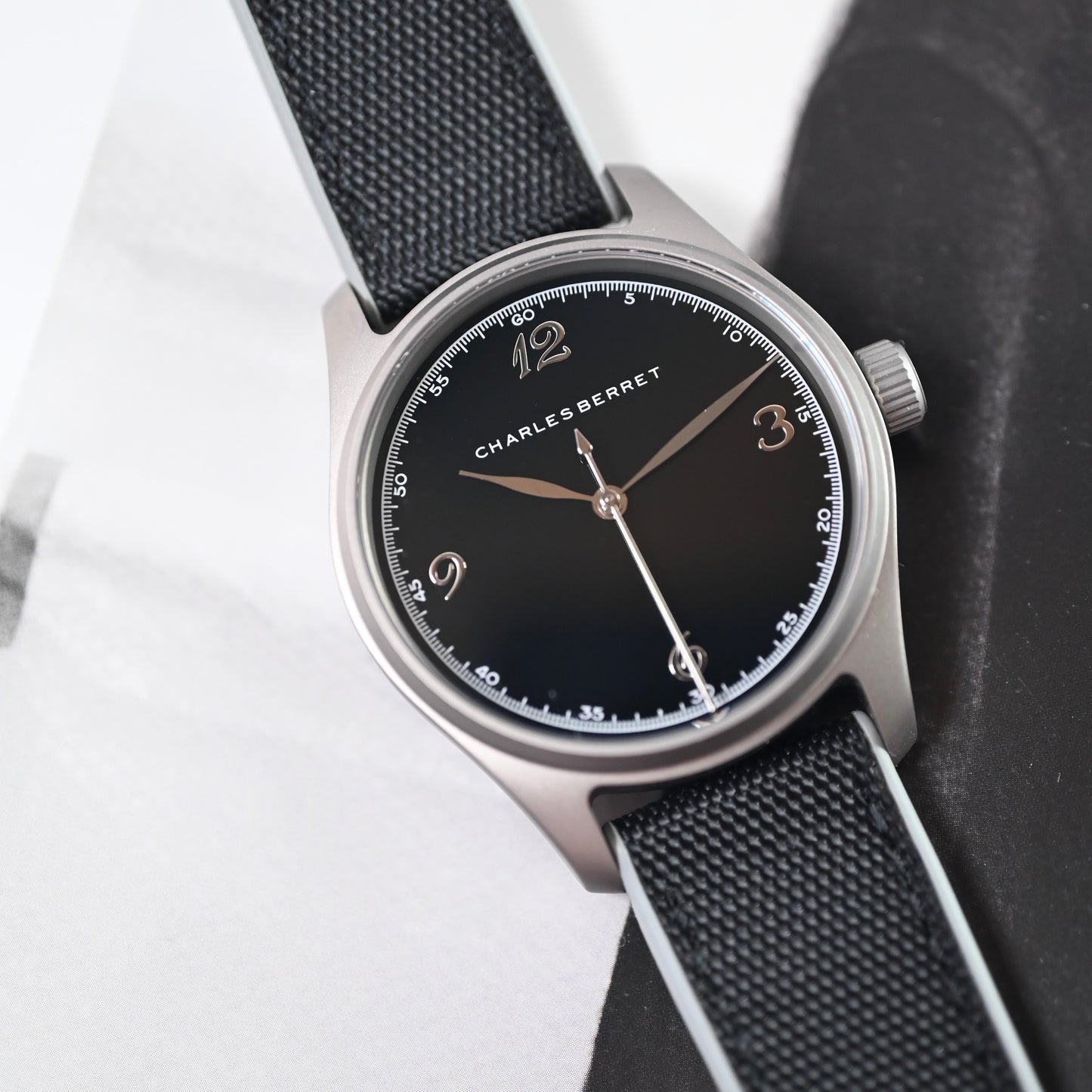 TITAN EBONY - titanium case , black porcelain dial, automatic movement