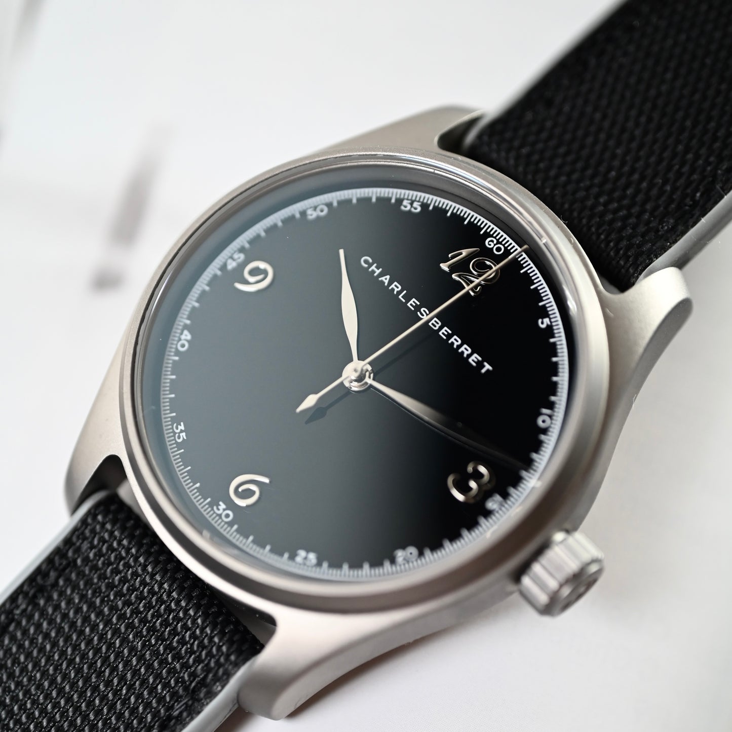 TITAN EBONY - titanium case , black porcelain dial, automatic movement