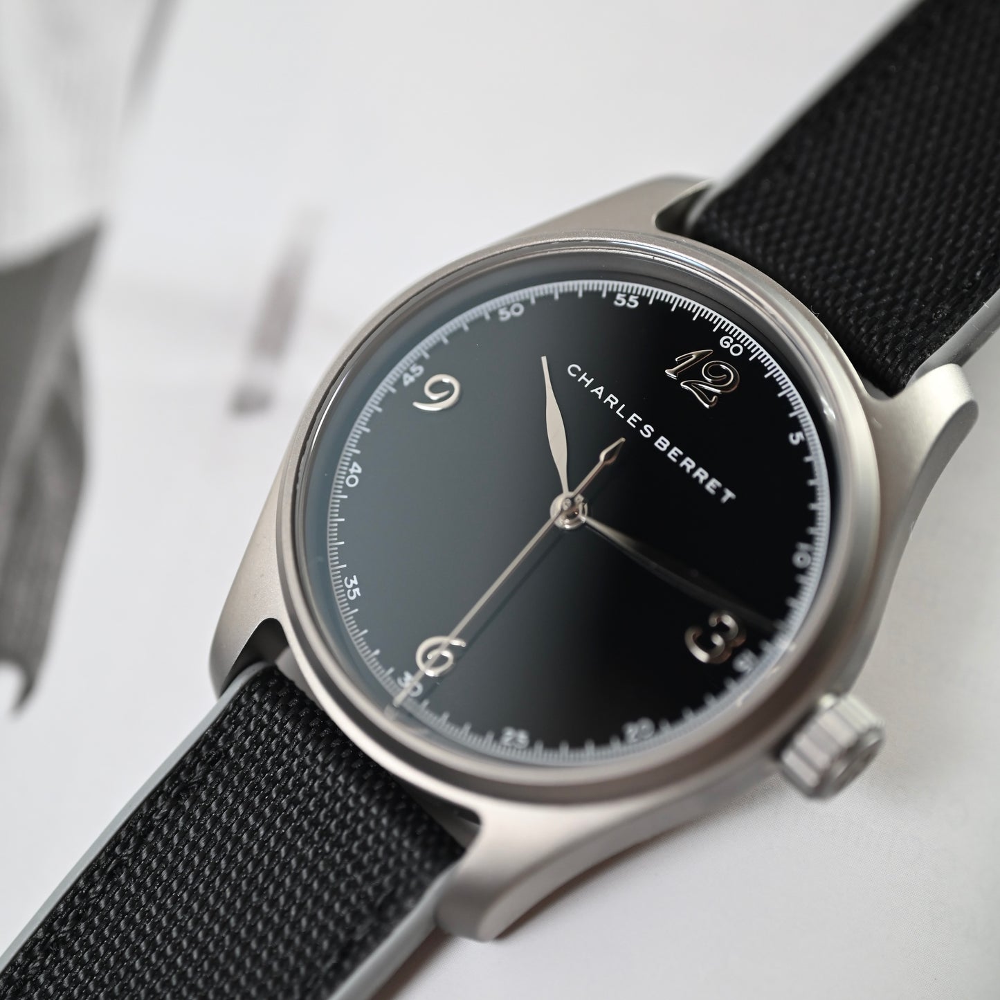 TITAN EBONY - titanium case , black porcelain dial, automatic movement