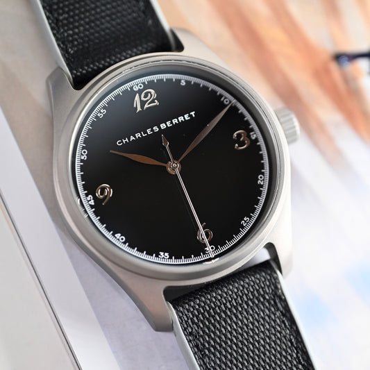 TITAN EBONY - titanium case , black porcelain dial, automatic movement